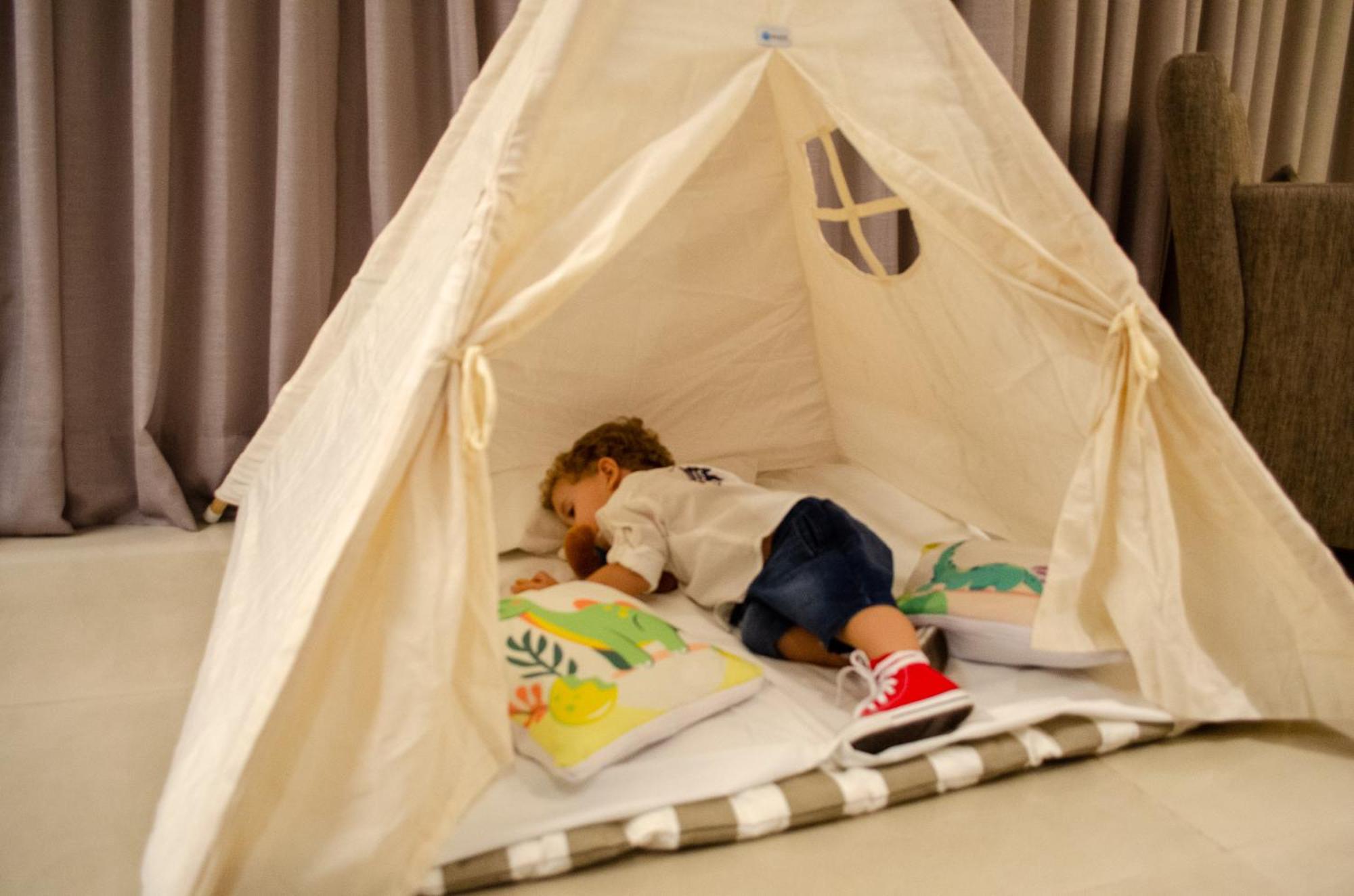 Royal Boutique Savassi Hotel Belo Horizonte Zewnętrze zdjęcie A child playing in a teepee