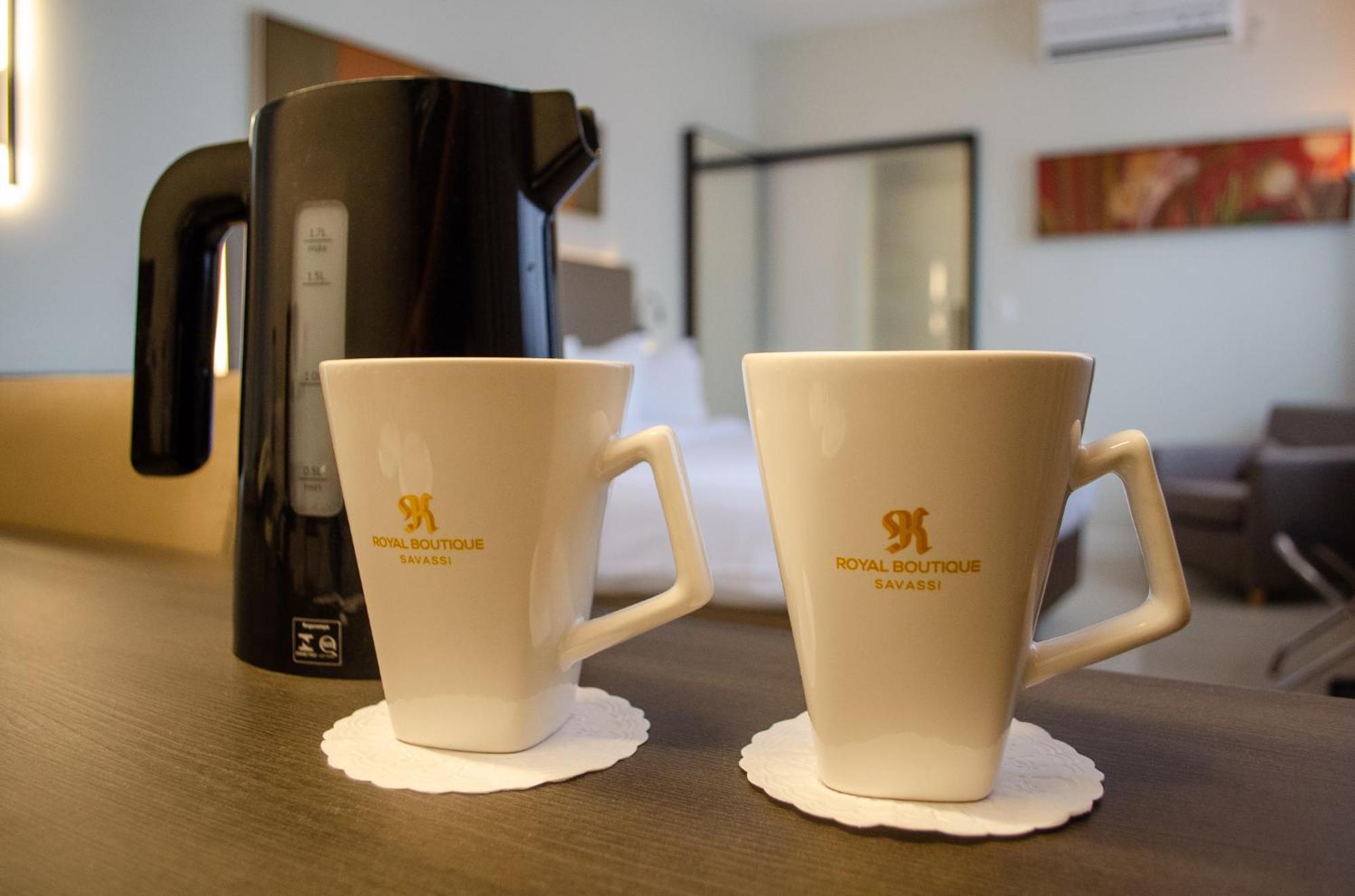 Royal Boutique Savassi Hotel Belo Horizonte Zewnętrze zdjęcie A kettle and two cups
